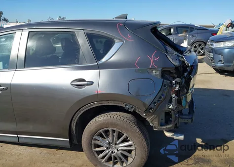 2020 Mazda Cx-5 Touring z USA, uszkodzony, nr VIN JM3KFACM5L0800140